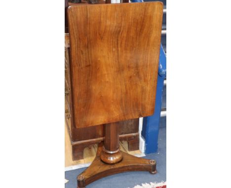 An early Victorian rosewood centre table of rectangular form on pillar and platform base W.68cm