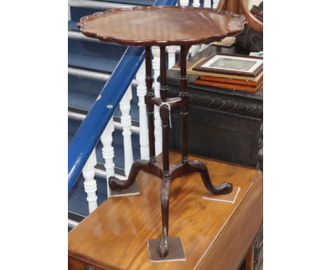 A George III style mahogany triple stem occasional table Diameter 52cm