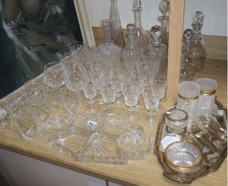 A part suite of cut table glassware with bucket-shaped bowls, an hors d'oeuvres set on plated tray and a smoker's set