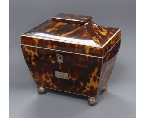 An early 19th century white metal mounted tortoiseshell sarcophagus tea caddy H.15cm, W.15cm