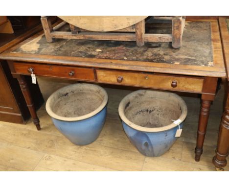 A mid 19th century mahogany partner's desk W.150cm