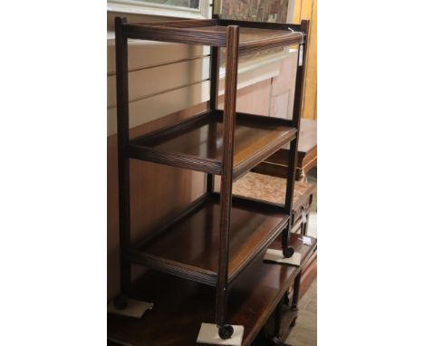 An Edwardian mahogany three tier buffet W.66cm