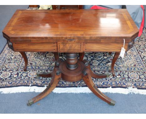 A Regency ebony strung mahogany card table W.90cm