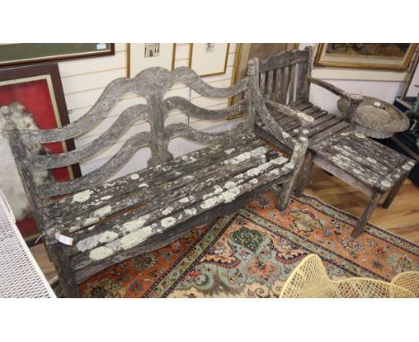 A weathered teak six piece garden furniture set Benches 150cm&nbsp;PLEASE NOTE 20% IMPORT TAX IS PAYABLE ON THE HAMMER&nbsp;&
