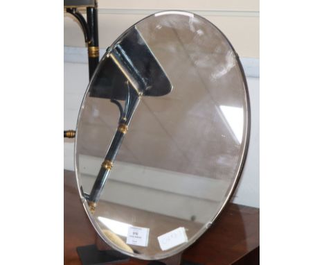 An oval bevelled easel dressing table mirror H.46cm