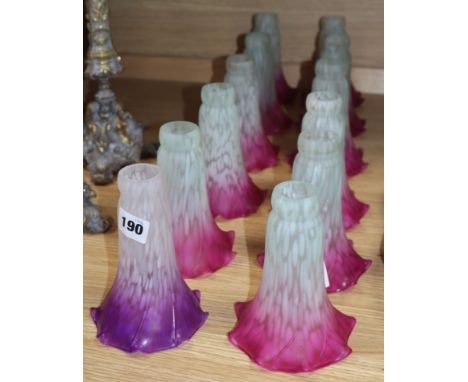 A set of twelve opaque glass lamp shades