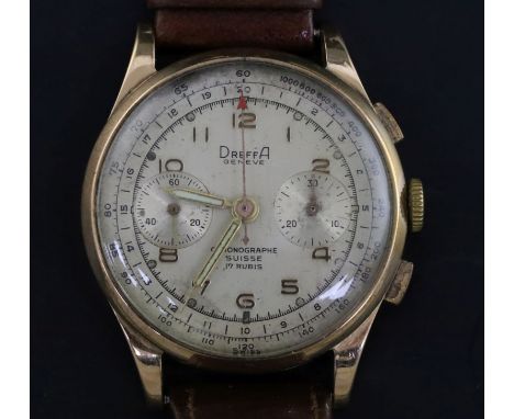 A gentleman's Dreffa Geneve 18ct gold manual wind chronograph wrist watch, with silvered dial, on associated leather strap