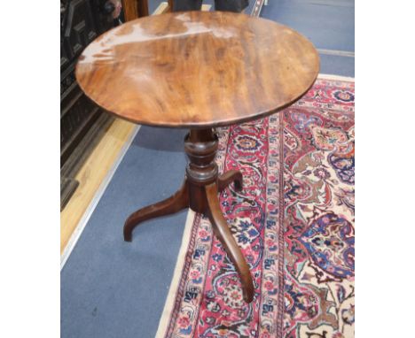 A George III circular mahogany tilt top tea table Diameter 55cm