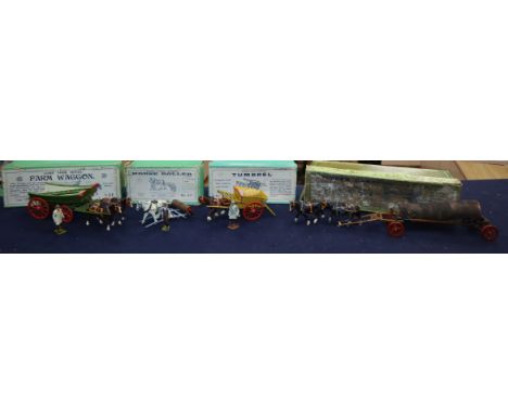 A collection of pre-war Britain's Home Farm series models including a boxed farm wagon, boxed timber carriage, boxed tumbrel 