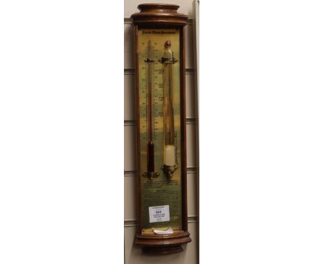 A modern 'storm glass' barometer in bow-fronted case H.46cm