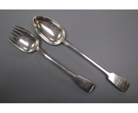 A Victorian provincial silver fiddle pattern basting spoon and a George IV silver spoon converted to a salad fork.&nbsp;PLEAS