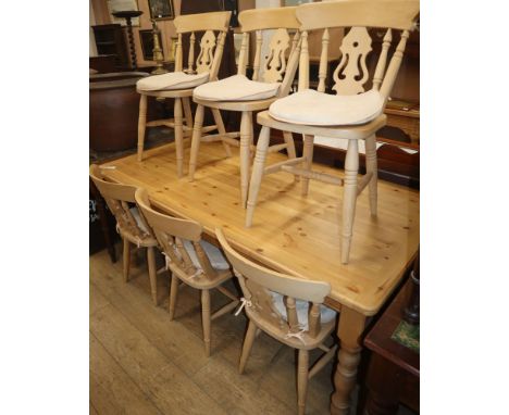 A pine kitchen table and six beech chairs L.180cm