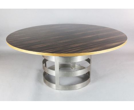 A contemporary macassar ebony veneered circular dining table, with brushed steel strapwork drum base, diameter 169.5cm