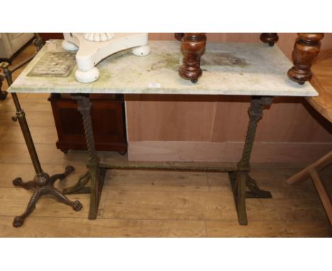 A Victorian marble top wrought iron garden table W.106cm