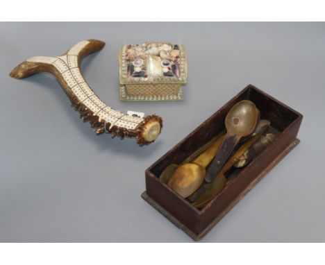 A stag antler cribbage board, a shell encrusted box and a collection of horn spoons cribbage board length 8cm