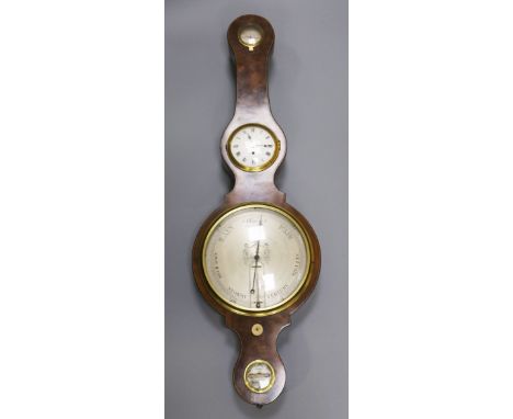 J. Somalvico, Hatton Garden. An early 19th century strung mahogany wheel barometer with hygrometer, timepiece, dial incorpora