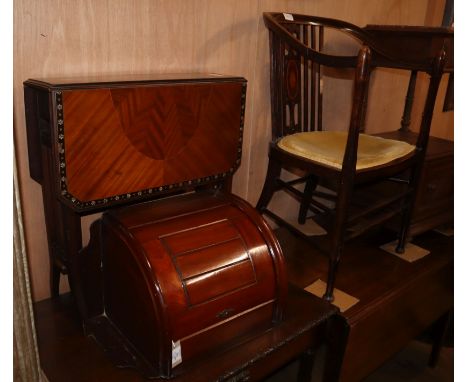 An Edwardian Sutherland table, an Edwardian elbow chair and a bowfront corner cabinet (3)