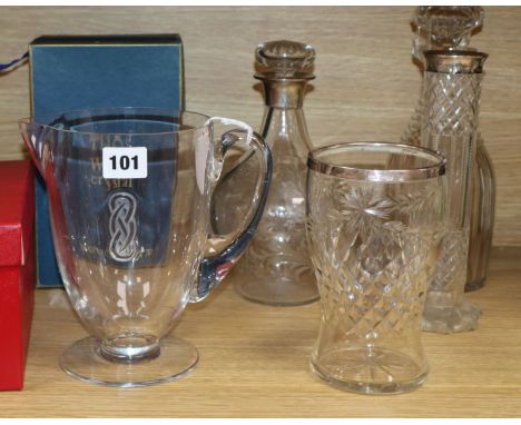 A Lalique 'Guebwiller' lemonade jug and six other glass items, comprising a cut and engraved bulbous decanter with silver col