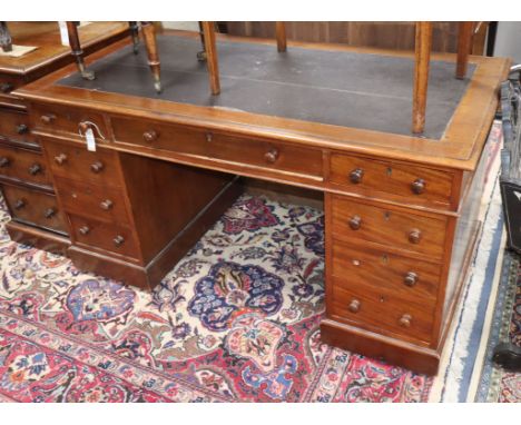 A Victorian mahogany pedestal desk W.138cm
