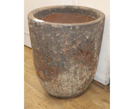 An Atlantis garden planter H.60cm