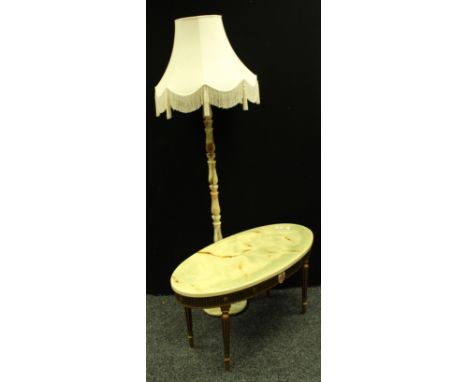 An oval faux-onyx coffee table; an onyx standerd lamp (2) 