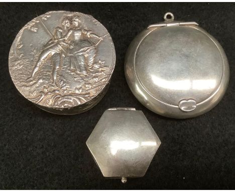 An early 20th century continental silver snuff box, embossed with figures, stamped 930, import marks, London 1902; a powder b