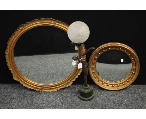 A Regency reproduction convex wall mirror, applied with spheres, 41cm diameter overall; another similar reproduction wall mir