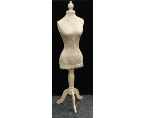 A dressmaker's mannequin. 