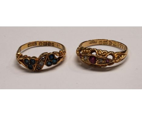 An 18ct gold diamond and ruby ring, 2.5g; another 18ct gold diamond ring, 2.6g (2) 