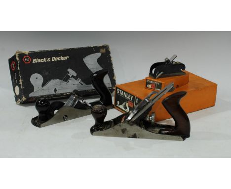 Carpentry Tools - a Stanley woodworking plane, no 4, boxed; another Stanley plane, no 75, boxed; a Black and Decker rebate ty