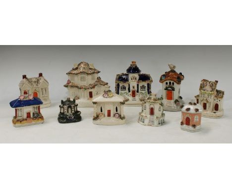 A 19th century cottage flat back model, applied with shredded clay, 16cm high, c.1880;  others, various (10) 