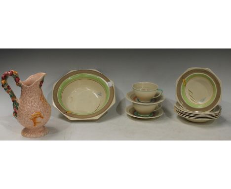 A Clarice Cliff harvest jug, printed mark to base; Two Susie Cooper Art Deco cups and saucers; a Burleigh Ware dessert set fo