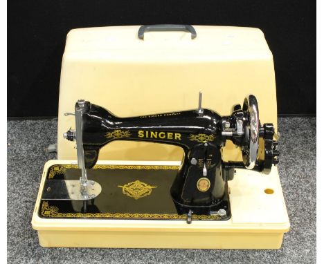 A Singer sewing machine, hand cranked, Nostelgia Model 15, 'Red S', RAF decals, plastic case 