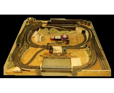 Model Railway - an extensive 00 gauge dual layer, seven section train layout including tunnels, bridge, power units, etc, par
