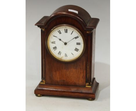An oak cased mantel clock 