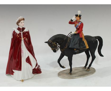 A Royal Worcester figurine, Queen Elizabeth II, dressed in robes of The Order of The British Empire; a Country Artists resin 