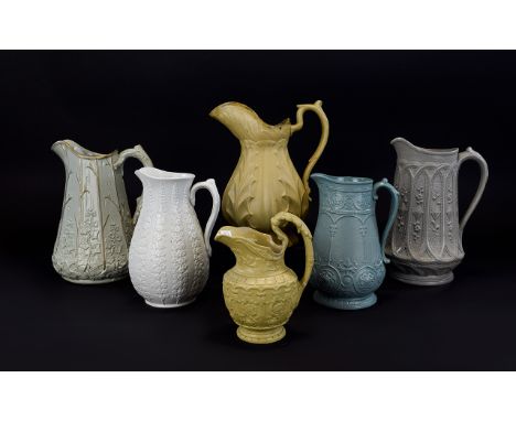Six Various 19thC Stylised Flower and Leaf Moulded Jugs including two diverse grey jugs with panels, one of ivy leaves and gi