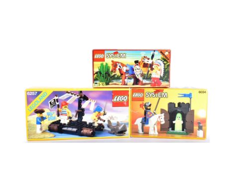 Lego - x3 vintage Lego System and Legoland sets comprising; 6034 Black Monarch's Ghost, 6257 Castaway's Raft and 6709 Tribal 