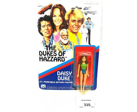 Mego vintage The Dukes of Hazzard Daisy Duke 3 3/4" figure MOC, Near Mint, within Good (dented and yellowed) bubble, upon Exc
