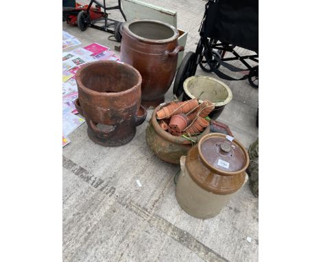 AN ASSORTMENT OF GARDEN ITEMS TO INCLUDE A TERRACOTTA STRAWBERRY PLANTER, A STONEWARE POT AND A CAST GUTTER HOPPER ETC 