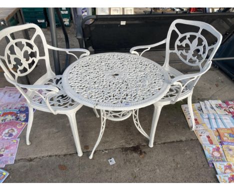 A WHITE CAST ALLOY BISTRO SET COMPRISING OF A ROUND TABLE AND TWO CHAIRS 