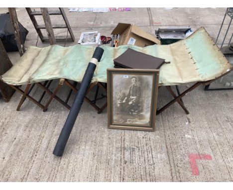 AN ASSORTMENT OF ITEMS TO INCLUDE A MILITARY CAMP BED, BRIEFCASE AND A PICTURE OF A SOLDIER ETC 