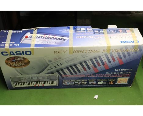 A CASIO, KEY LIGHTING, KEYBOARD, BOXED, VENDOR STATES IN WORKING ORDER, NO WARRANTY GIVEN 