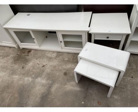 A MODERN WHITE LOW UNIT , NEST OF TWO TABLES AND BEDSIDE TABLE 