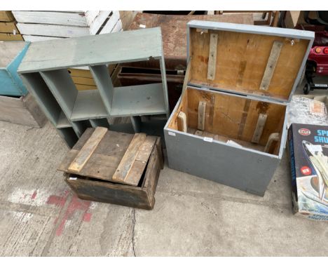 A LARGE METAL TRUNK AND THREE VARIOUS WOODEN STORAGE UNITS 