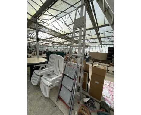 FOUR VARIOUS STEP LADDERS TO INCLUDE A 7 RUNG ALUMINIUM SET ETC 