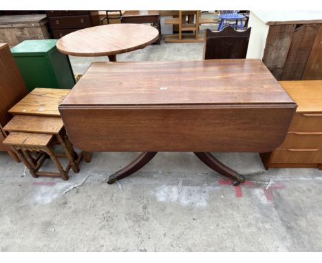 A 19TH CENTURY MAHOGANY PEDESTAL DROP LEAF TABLE WITH BRASS CASTERS 48" SQUARE OPENER 