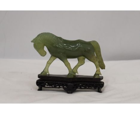 A JADE HORSE ON STAND 