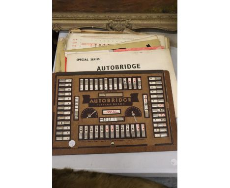 A VINTAGE 'AUTOBRIDGE' CONTACT BRIDGE SET WITH PLAYING BOARD AND DEAL SHEETS 