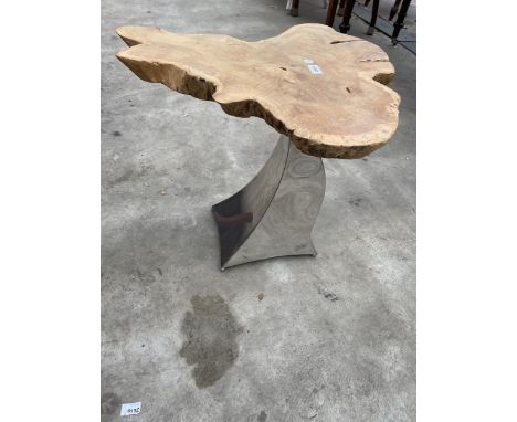 A LIVE EDGE OCCASSIONAL TABLE ON POLISHED CHROME BASE 